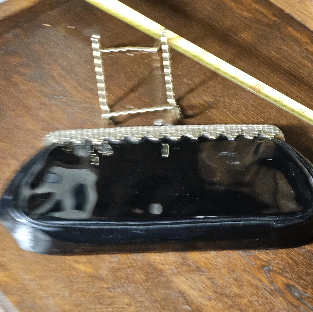 Elegant Black Clutch with Gold Accents